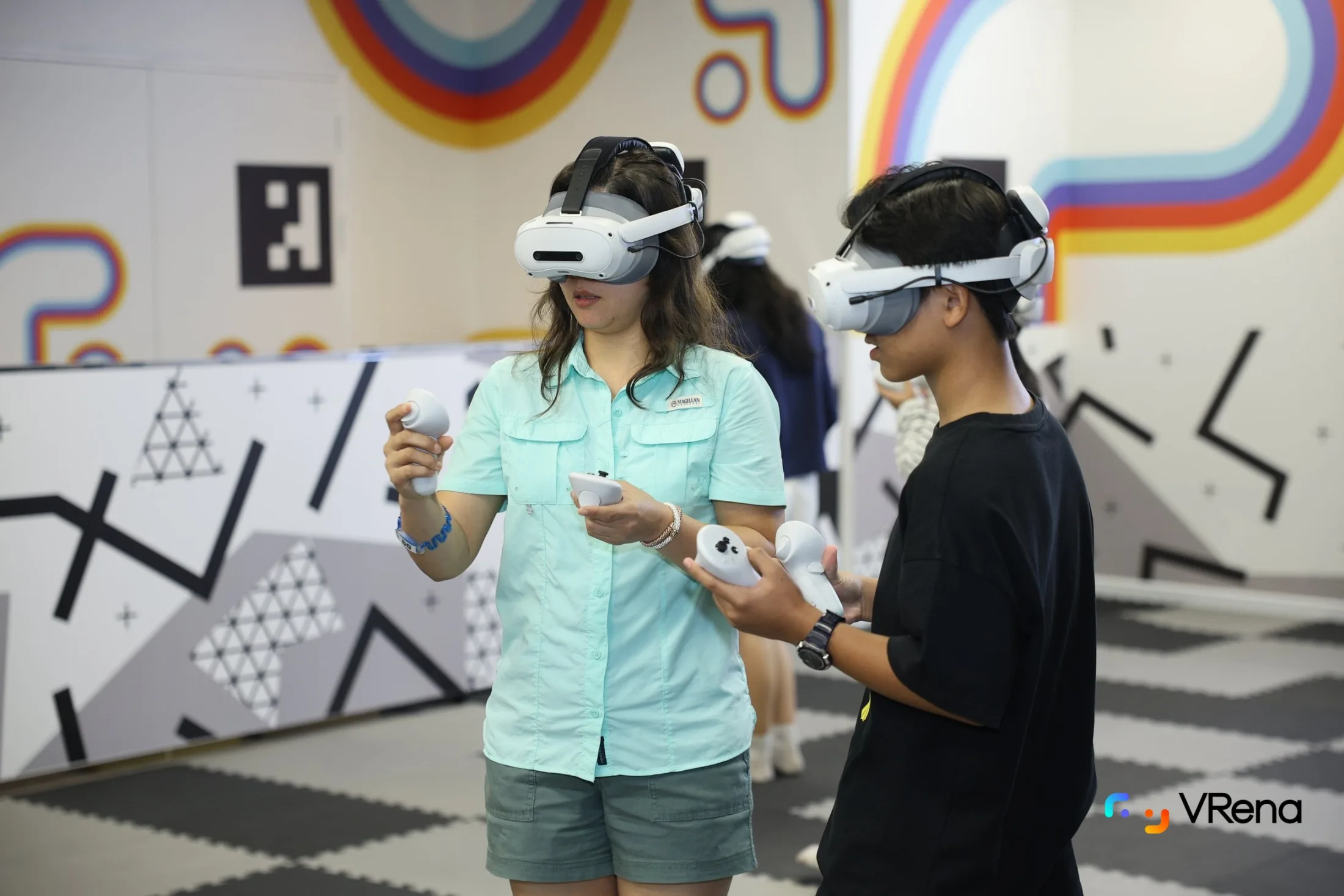 A parent and child exploring VR together at VRena