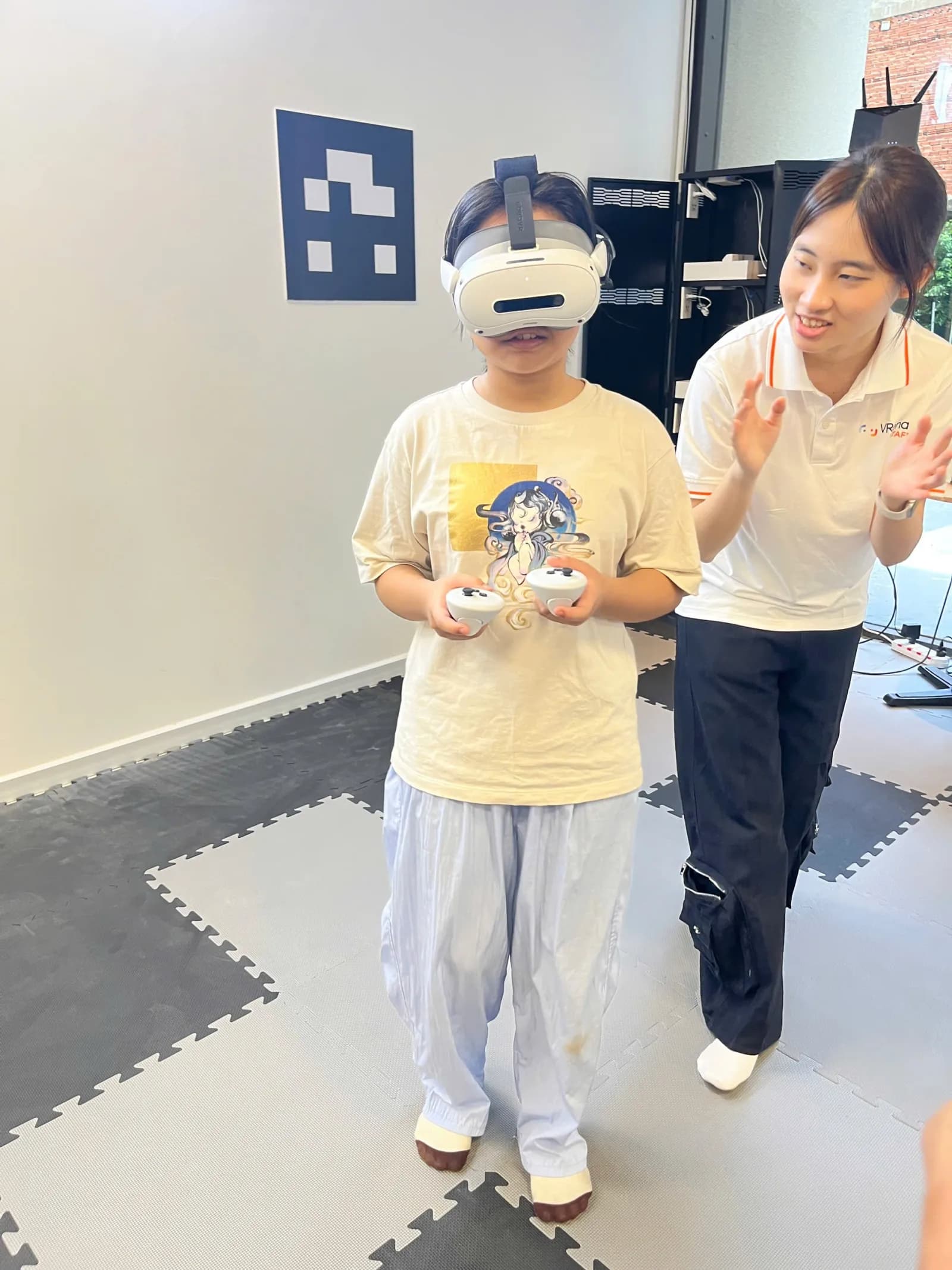A VRena host guiding a first-time player