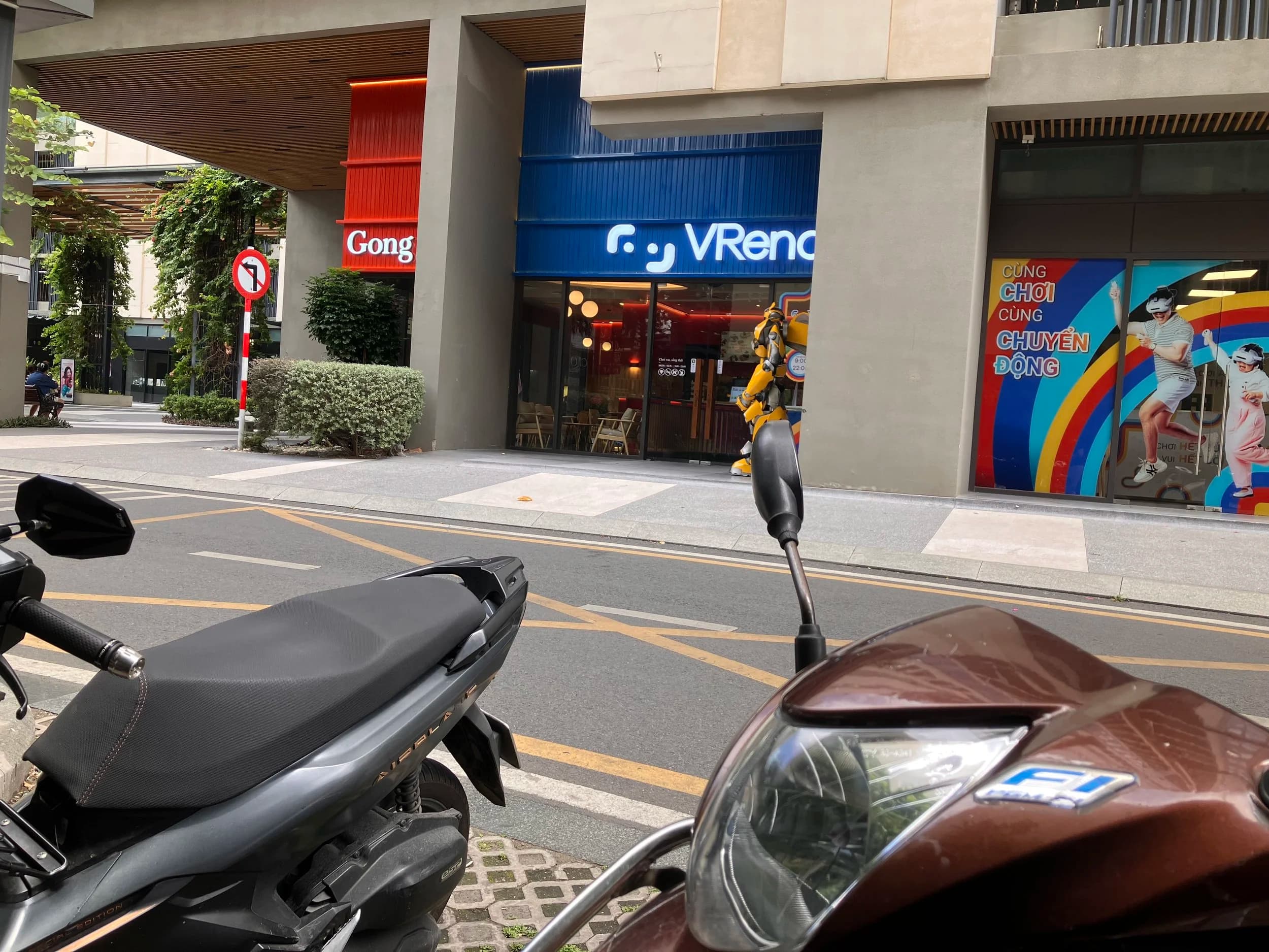 Motorbike parking outside the VRena entrance
